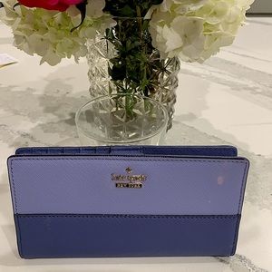 Kate Spade Cameron Slim Bi-Fold Wallet. Two tone periwinkle color.